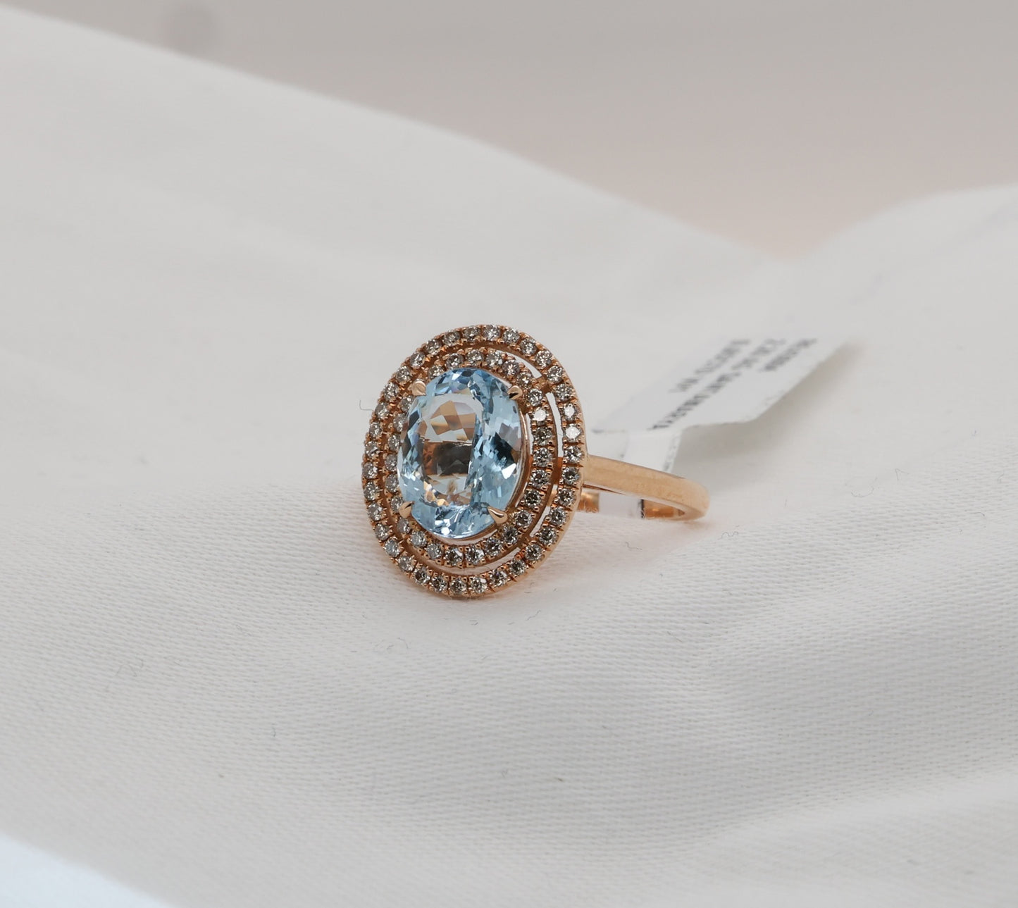 Aquamarine (Santa Maria) ring in 18 Karat Rosegold with diamonds