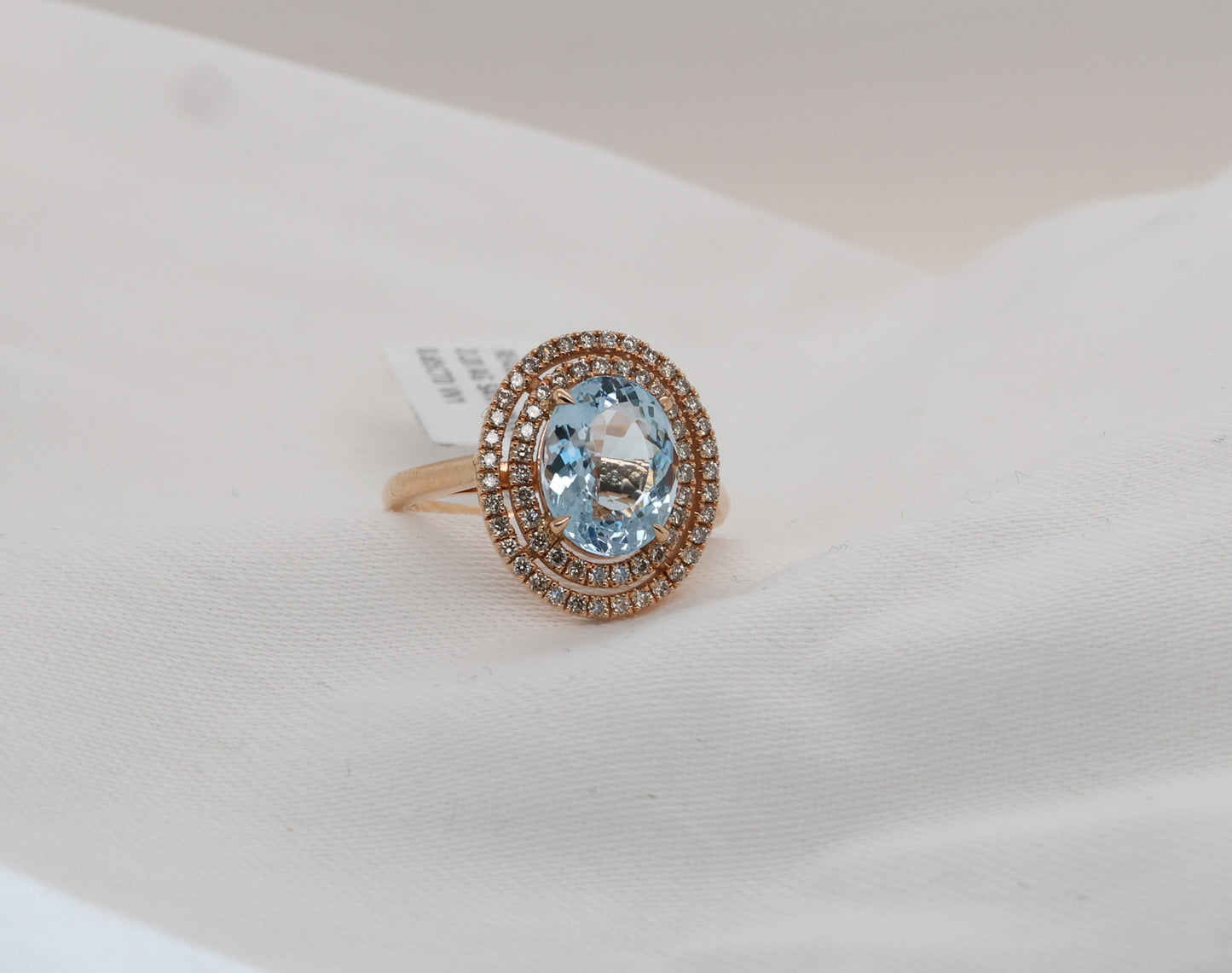 Aquamarine (Santa Maria) ring in 18 Karat Rosegold with diamonds
